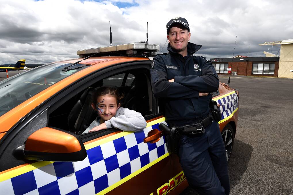 Jason Doyle Acting Sergeant with Kayla. Picture: Adam Trafford 