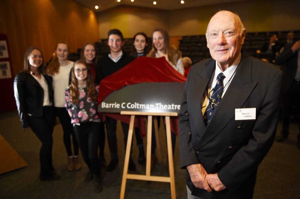 Barrie Coltman with grandchildren Jess Beauchamp, Sarah Beauchamp, Lexie Patience, Phillipa Beauchamp, Angus Coltman, Hannah Patience and Alice Coltman at the dedication of the Barrie Coltman Theatre at Ballarat Clarendon College. 