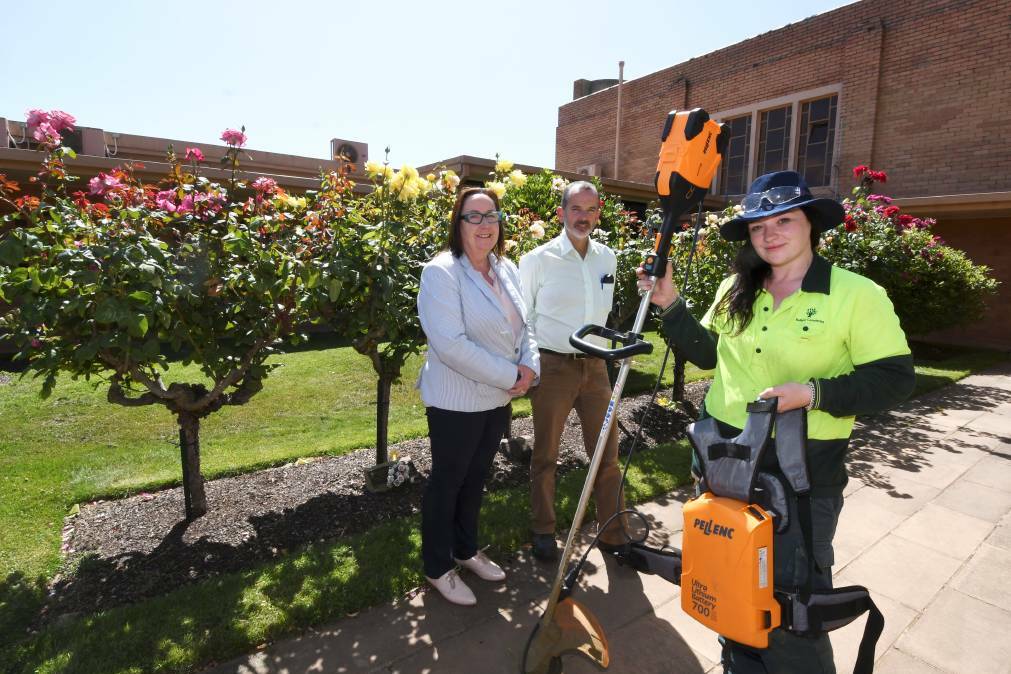 SOLAR POWER: Annie De Jong, Charlie Stebbing and Alex Lee in February 2020 working to switch Ballarat Cemeteries to renewable energy with the help of Ballarat Community Power Hub. Picture: Lachlan Bence 