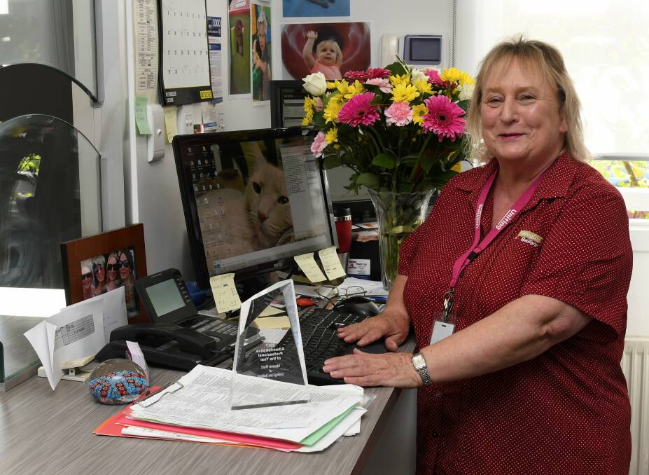 WELCOME: Maxine Reid has worked as a receptionist at Uniting Care Ballarat for 15 years. She was awarded Administrative Professional of the Year. Picture: Lachlan Bence 