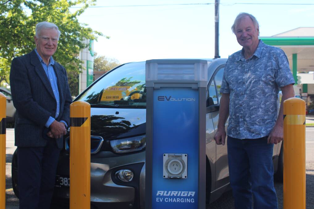 CHARGING UP: Australian Electric Vehicle Association members Steve Higgs and Steve Carter at the Buninyong charging station. 