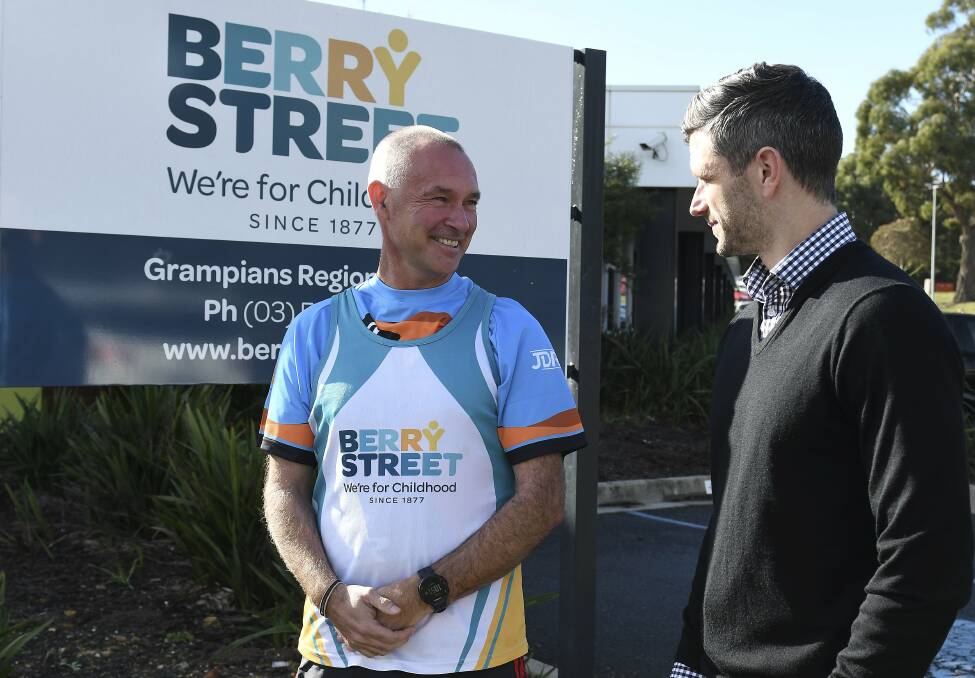 BELOW: Mick Marshall and Berry Street western region deputy director Warrick Remilton are hoping to raise more than $143,000 during the year long running campaign. Picture: Lachlan Bence 