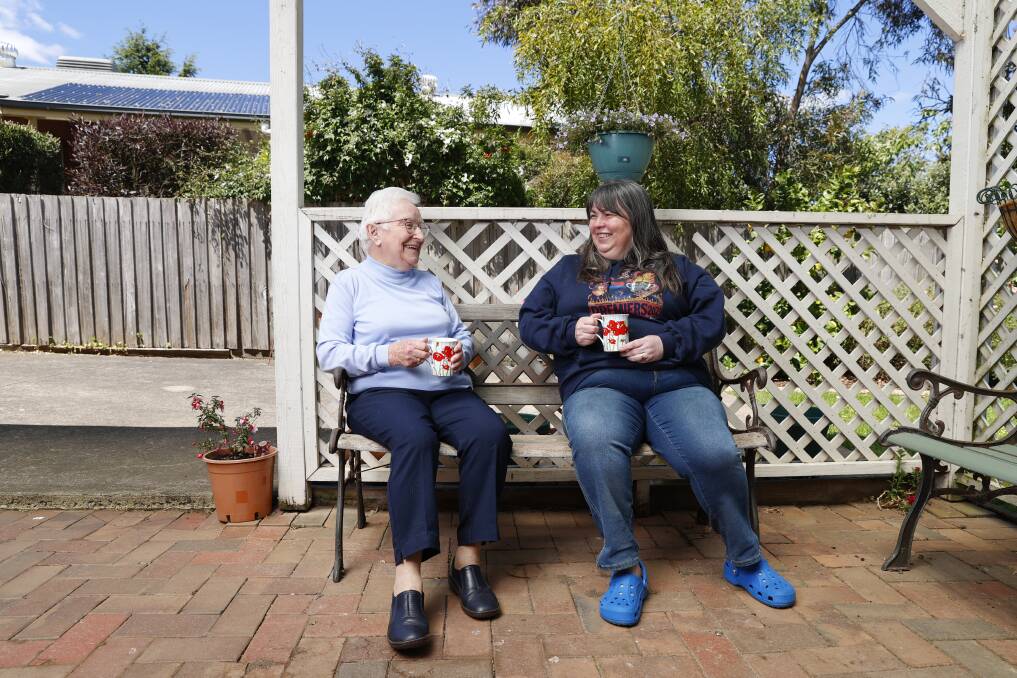 TOGETHER: Judith Lukeis and her niece Ruth Dunn catch up for the first time in seven months restrictions on travel eased on Friday. Picture: Luke Hemer 