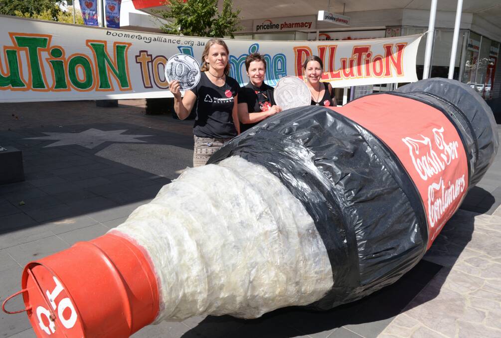 CONTAINER DEPOSIT SCHEME: Annett Finger from the Boomerang Alliance, Cr Belinda Coates and Nicole Elliott from No Waste Ballarat are calling for a container deposit scheme in Victoria. The Boomerang Alliance travelled through regional Victoria with a 3m-long giant Coke bottle to campaign in April. 