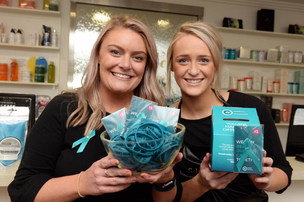HAIR FOR CARE: Liana Furness and Tayla Marchant will be volunteering their time at Alfredton Hair and Beauty to raise funds for ovarian cancer. Picture: Kate Healy 