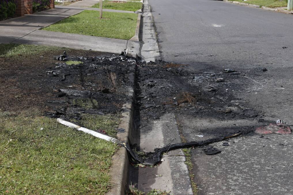 A burnt patch remains where a car was on fire in Carpenter Street in Wendouree. 