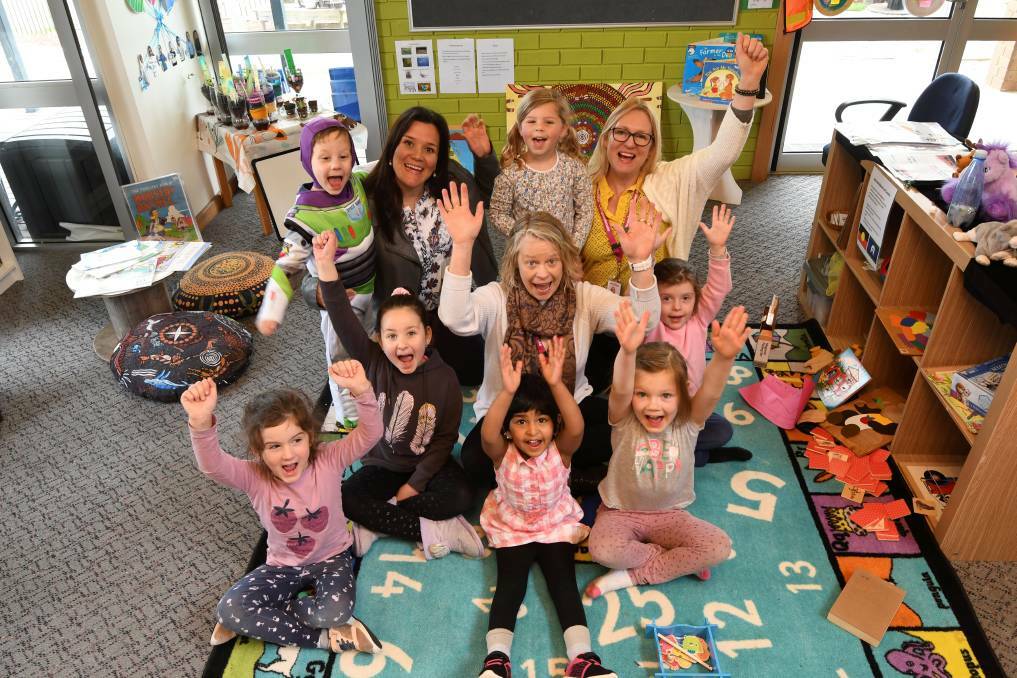 DIFFERENT TIMES: Children with Renata Cordioli, Sherri Heaton and Cathie Coles at Uniting's Cardigan Village kindergarten last year. Picture: Lachlan Bence 