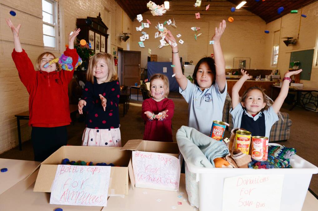 FOR COMMUNITY: Maddie, 5, Sarah, 5, Lucy, 3, Tano, 11 and Ava, 8 are collecting bread tags, bottle caps and donations for the Soup Bus. Picture: Kate Healy 