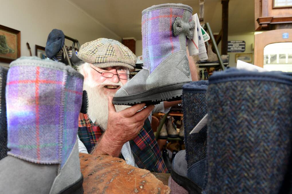 WARM: Bob Petch hold a new product, the Harris Tweed ugg boot at the Gordon Boot Shoppe. 