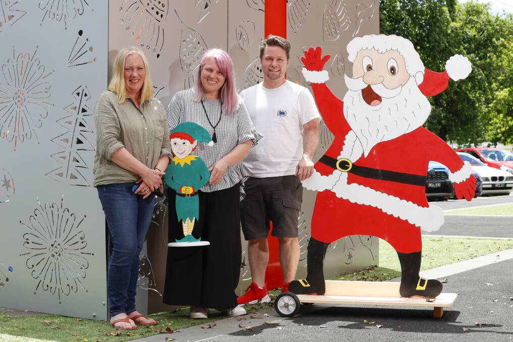 CREATIVE CHRISTMAS: Artists Lesley Hale, Lisa Cressey and Justin Weyers have played a big role in bringing Christmas joy to Buninyong. Picture: Luke Hemer 