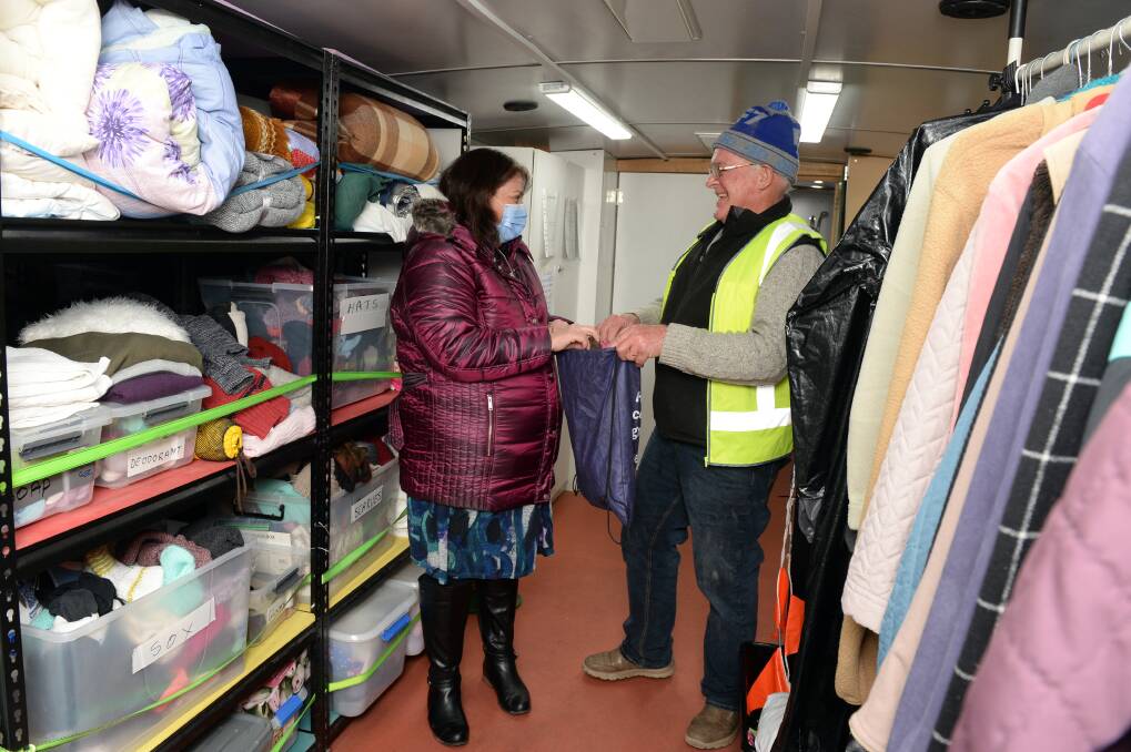 SUPPORT: One Humanity Shower Bus volunteers Danni Trezise and Wayne Scanlon were on board on Thursday night to offer showers and warm clothes to people in need. Pictures: Kate Healy 