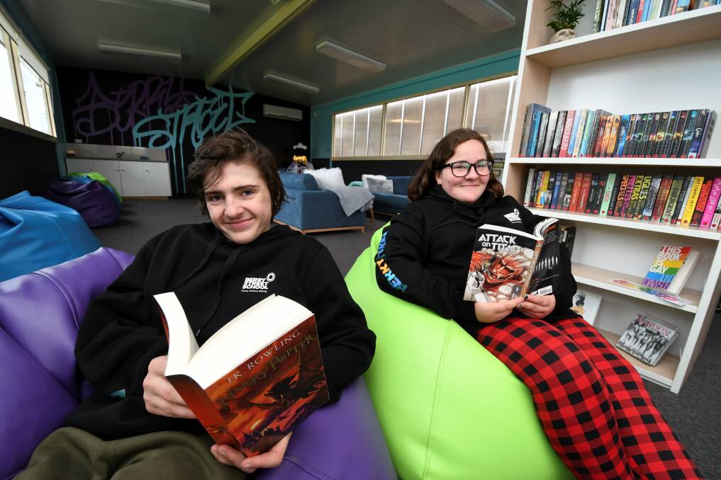READ: 14-year-old Lachlan and 14-year-old Rachael in the new library at Berry Street School. Picture: Lachlan Bence 