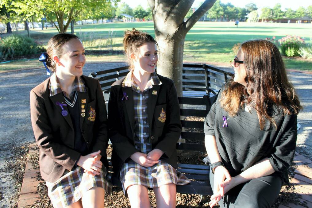 INSPIRE: Astrophysict Virginia Kilborn speaks to year 12 students Alexandra Tatham and Molly Esmonde. Picture: Rochelle Kirkham 