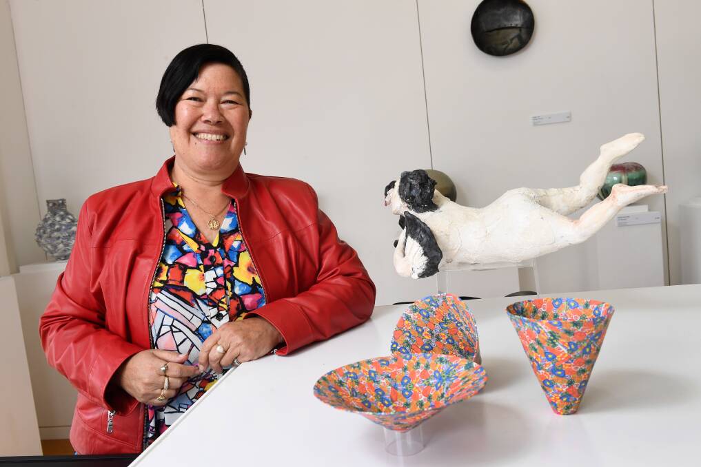 ART PRIZE: Queensland artist Lee Berryman with her work 'Kaleidoscope' at the Clunes Ceramic Awards. Picture: Adam Trafford 