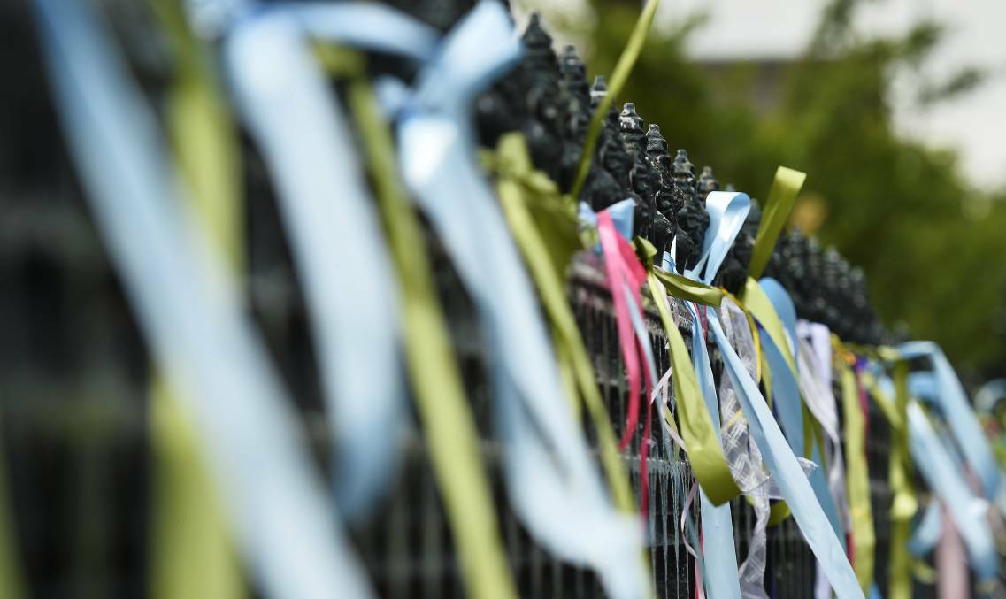  MOVING: A file photo of ribbons on the St Patrick's Cathedral fence, a sight that has become familiar in Ballarat in recent years. Picture: Dylan Burns.

