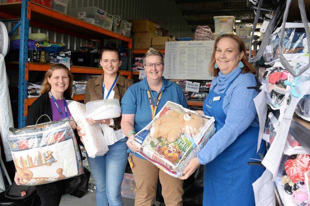 GIVING: CAFS staff Vikki Doddamani, Sarah Hinchliffe, Lany Johnson and Eureka Mums operations manager Trinsa Lewis. Picture: Kate Healy 