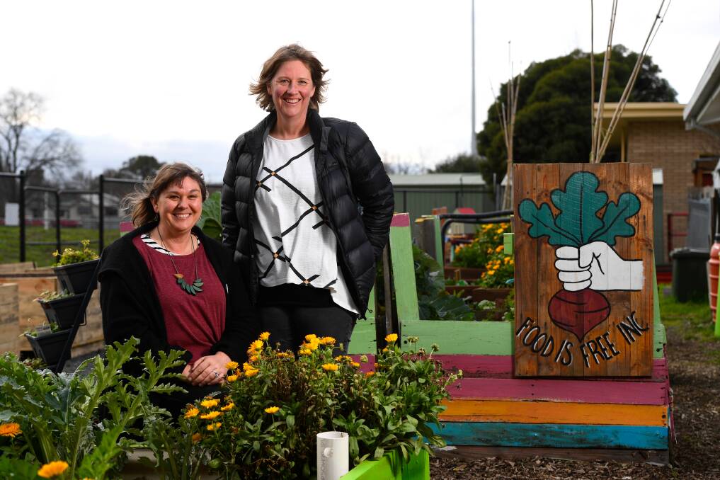 COMMUNITY DRIVEN CHANGE: Food Is Free founder Lou Ridsdale and volunteer manager Virgina Wilson at the Food Is Free Green Space. Picture: Adam Trafford 