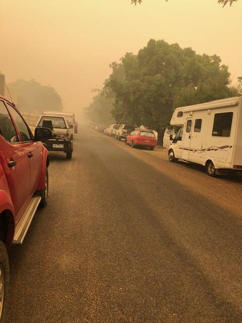 FIRE STRICKEN: A convoy of cars leaving Corryong on Thursday. Picture: Supplied