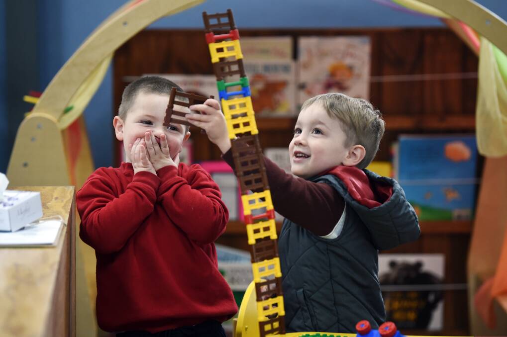 BALANCE: Mount Pleasant Kindergarten children Logan and Logan learn through play. Pictures: Kate Healy 