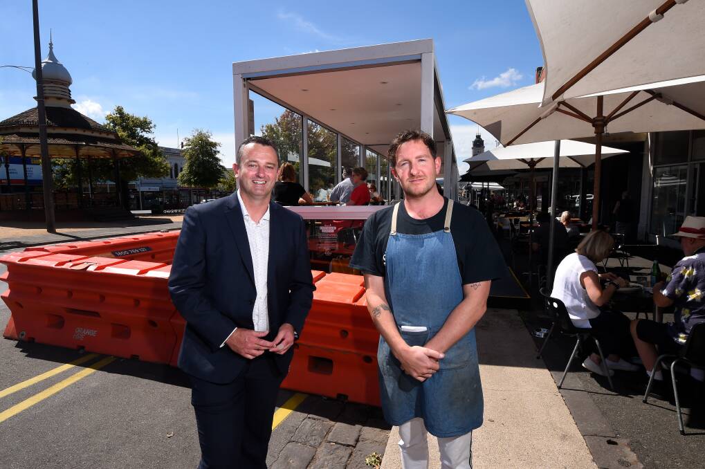 FEEDBACK: City of Ballarat mayor Daniel Moloney and Europa manager Josh Haire at the Sturt Street outdoor dining pods. Pictures: Adam Trafford 