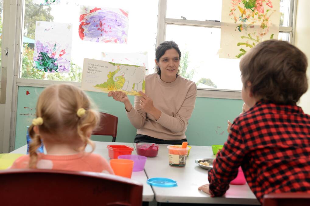 LANGUAGE: Sebastopol Spanish Playgroup Leader Araceli Zumaglini reads in Spanish to the children. Pictures: Kate Healy 