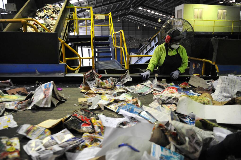 Workers at the Visy recycling plant in Brisbane. File picture. 