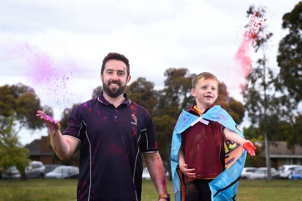 BRIGHT FUTURE: Delacombe Primary School teacher Anthony Cross and Tyler are looking forward to the colour run next week. Picture: Adam Trafford 