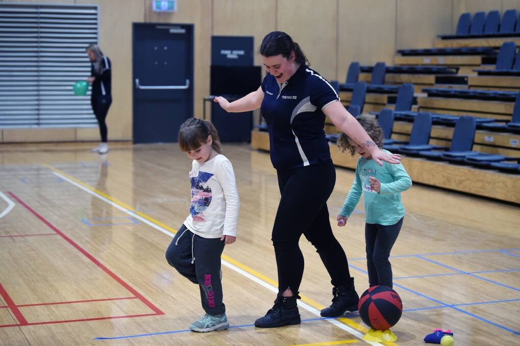 BALANCE: Poppy and Ruby participate in the Federation University Fun Moves Program. Pictures: Kate Healy 
