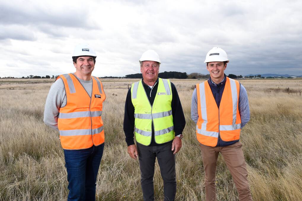 CHANGE: Troon Group managing director Tom McInerney, H Troon Pty Ltd managing director Steve Troon and Troon's Foodbank development manager Dion Gilbert at the Foodbank site in BWEZ. Picture: Adam Trafford 