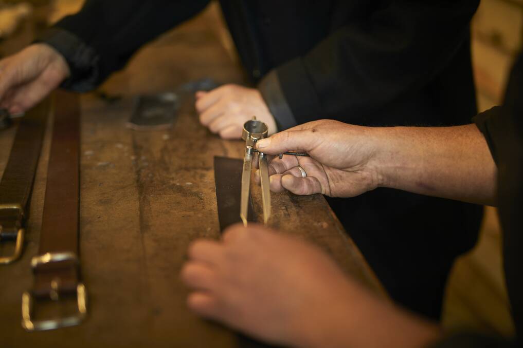 Leather belt making workshop at Sovereign Hill. Picture: Luka Kauzlaric 
