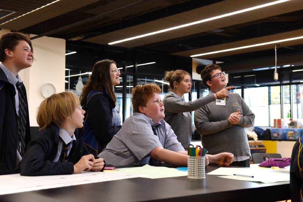 CREATIVE: A group of Mount Rowan students work together to refine their idea at the Ballarat Tech during the Crazy Ideas College Social Innovators program two day intensive course. Pictures: Aaron Sawall