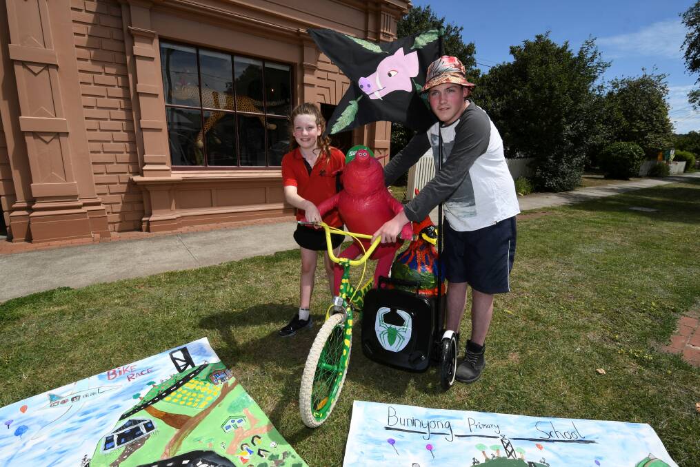 ON SHOW: Buninyong Primary School pupil Imogen and Ballarat Specialist school student Nathan helped create artwork for display in Buninyong. Picture: Lachlan Bence