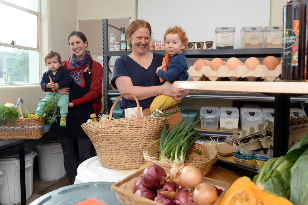 COMMUNITY: Ballarat Wholefoods Collective members Sophie Pritchard, Thomas, 1, and Katherine Scott with Micah, 2. Pictures: Kate Healy 