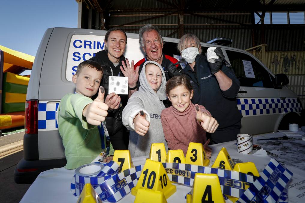 FOR THE KIDS: Hamish, 7, Charlotte, 9 and Bridgette, 8 with Challenge Camps coordinator Sarah Legg, Cops N Kids co-founder John Moloney and Ballarat Crime Scene office leading senior constable Dayna Mollison at the 2018 November camp. Picture: Dylan Burns 