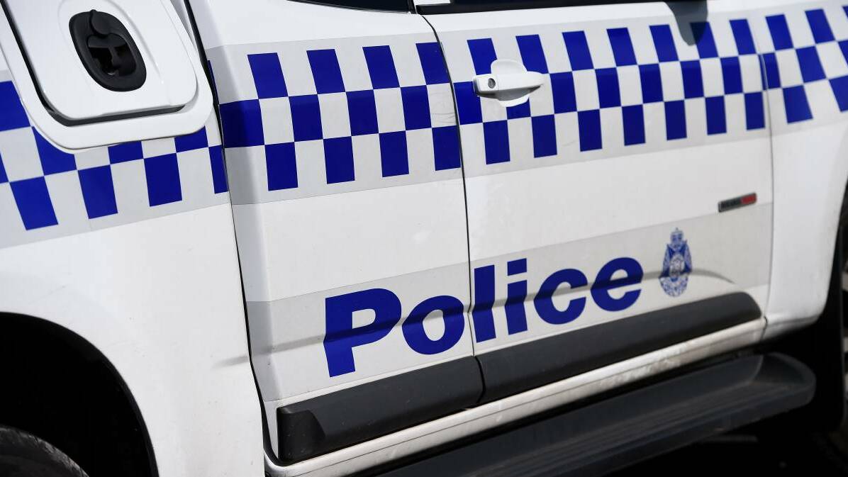 Police officer takes cover behind letterbox as young man rams car