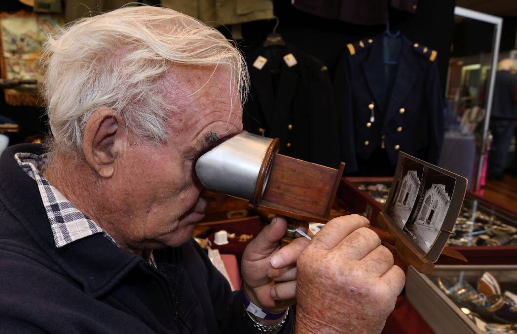 Mark Pilgrim with a stereoscope at the Ballarat Antique Fair. 