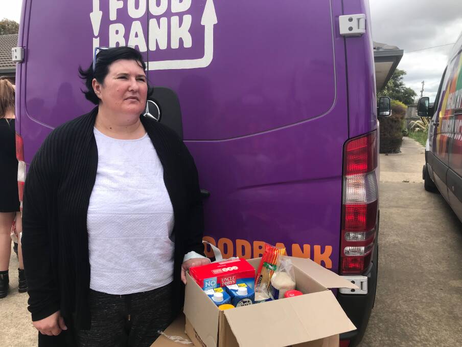 RELIEF: Mandy-Louise Weber visited the Foodbank Farms to Families market on Monday to collect fresh produce and essential items that will help her family this Christmas. Pictures: Rochelle Kirkham 