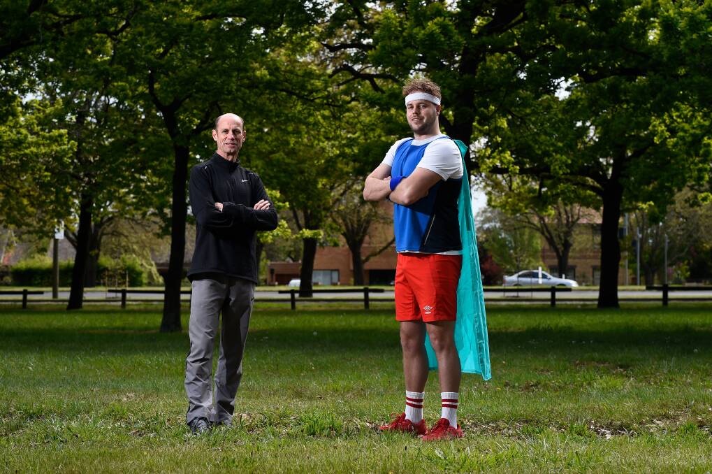 LOCAL HERO: Event ambassador Steve Moneghetti and local hero mascot Brayden Guareschi launch Run For A Cause. Picture: Adam Trafford 