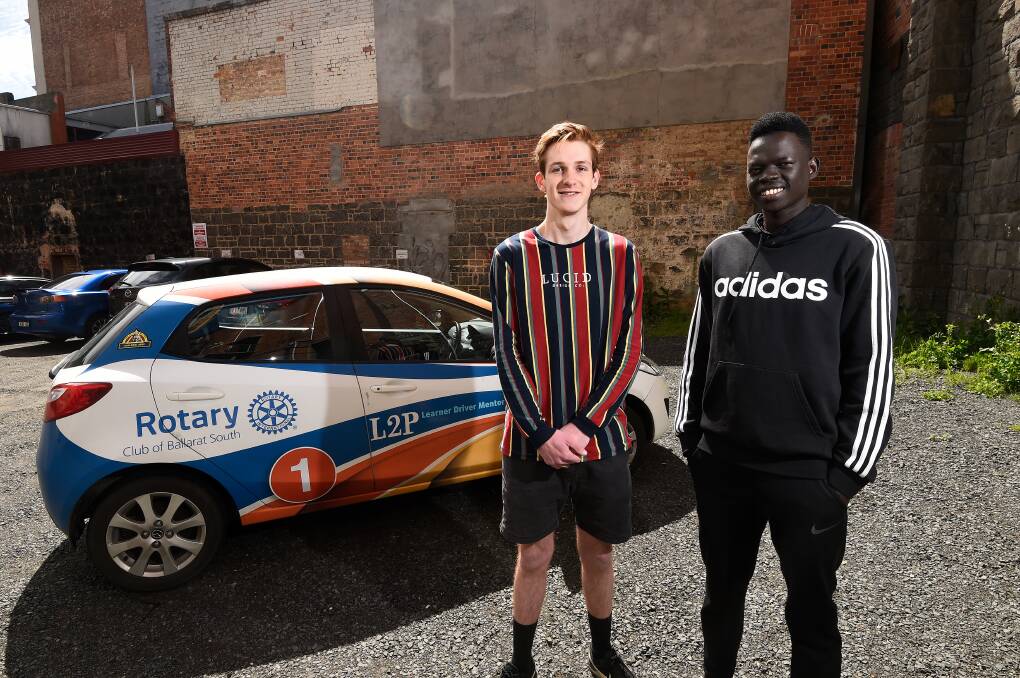 DRIVING SUPPORT: The L2P Learner Driver Mentor Program has helped Jake Strong and Okach Diw on their journey to gain their driver's license. Picture: Adam Trafford 