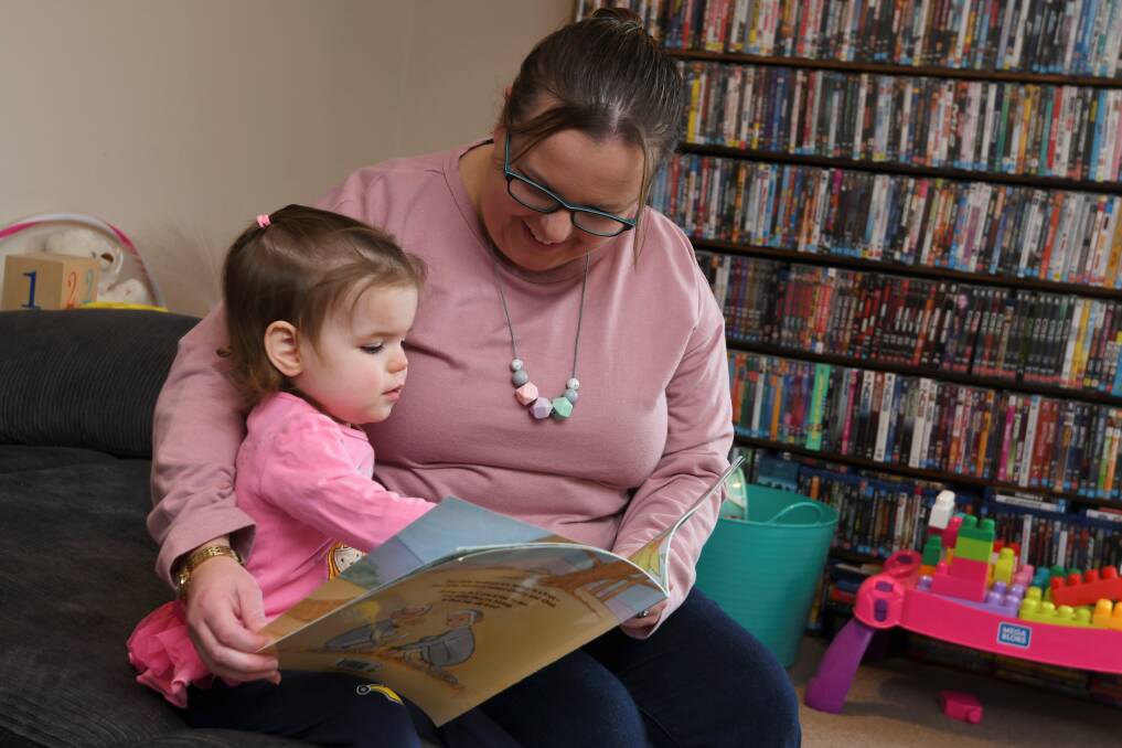 LITERACY: 22-month-old Charlotte Garlick and mum Rebecca Garlick love reading books that arrive in the letterbox each month from the Ballarat Reads Imagination Library program. Picture: Lachlan Bence 