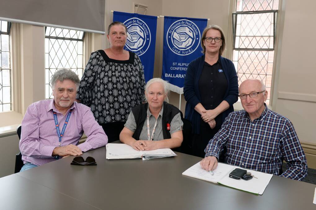 WORKING TOGETHER: Salvation Army's John Clonan, Uniting's Tania Jennings, Anglicare's Kim Boyd, Central Highlands Water's Rebecca Fletcher and St Vincent de Paul's Alan West. Pictures: Kate Healy