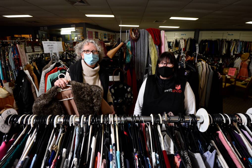 RE-OPENING: Salvation Army Creswick Road Thrift Shop volunteers Marie Lyons and Diane Lindsay are happy to be back in the store. Pictures: Adam Trafford 