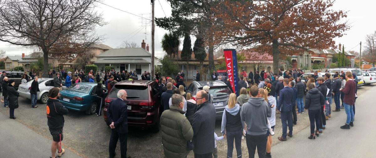 The auction of an unrenovated three bedroom house at 12 Talbot Street South drew a strong crowd on Saturday. Picture: Ballarat Real Estate 