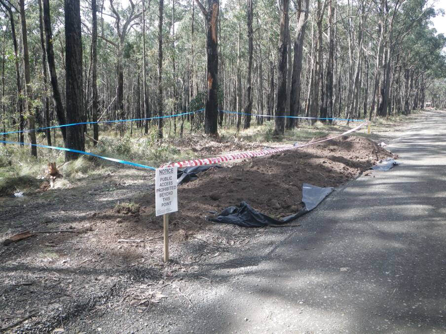 ILLEGAL: This supplied photograph shows the dumping of asbestos in the Wombat State Forest.
