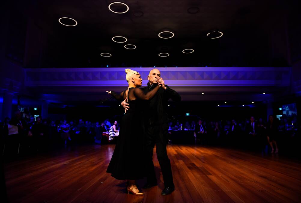George Fong and Ashlie Ross dance the Tango. 