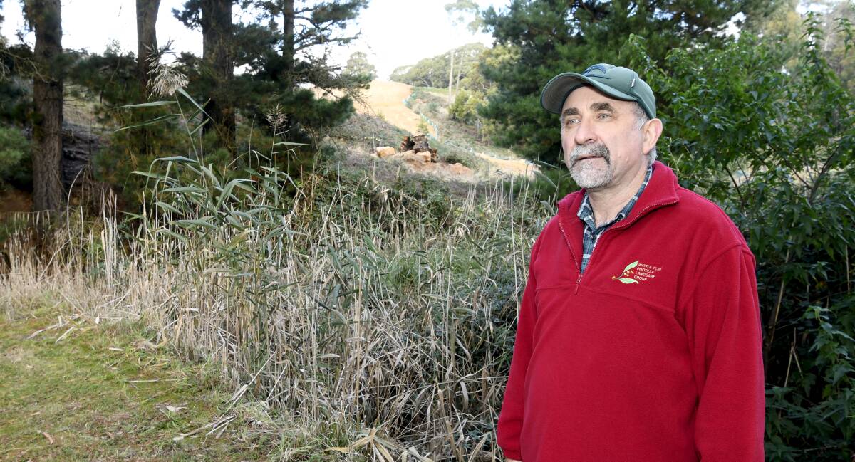 CONCERN: Brown Hill resident and Wattle Flat Pootilla Landcare group member Anthony Murphy is disappointed at sediment run-off affecting the river. Picture: Lachlan Bence 