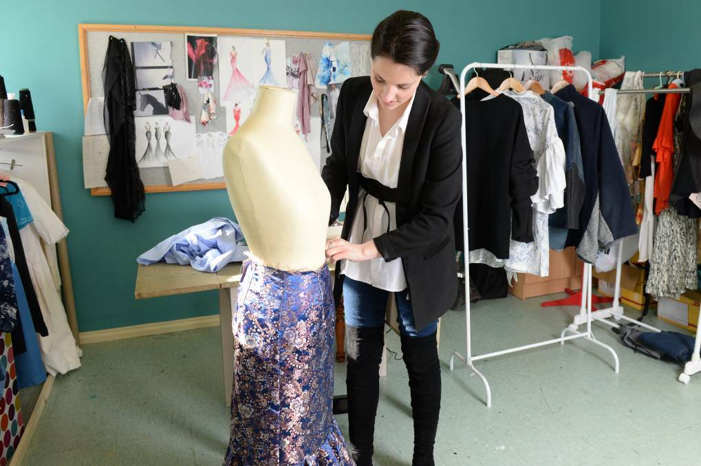CREATIVE: Fashion designer Bethany Jakob is passionate about encouraging women to think about altering their clothes rather than throwing them away. Picture: Kate Healy 