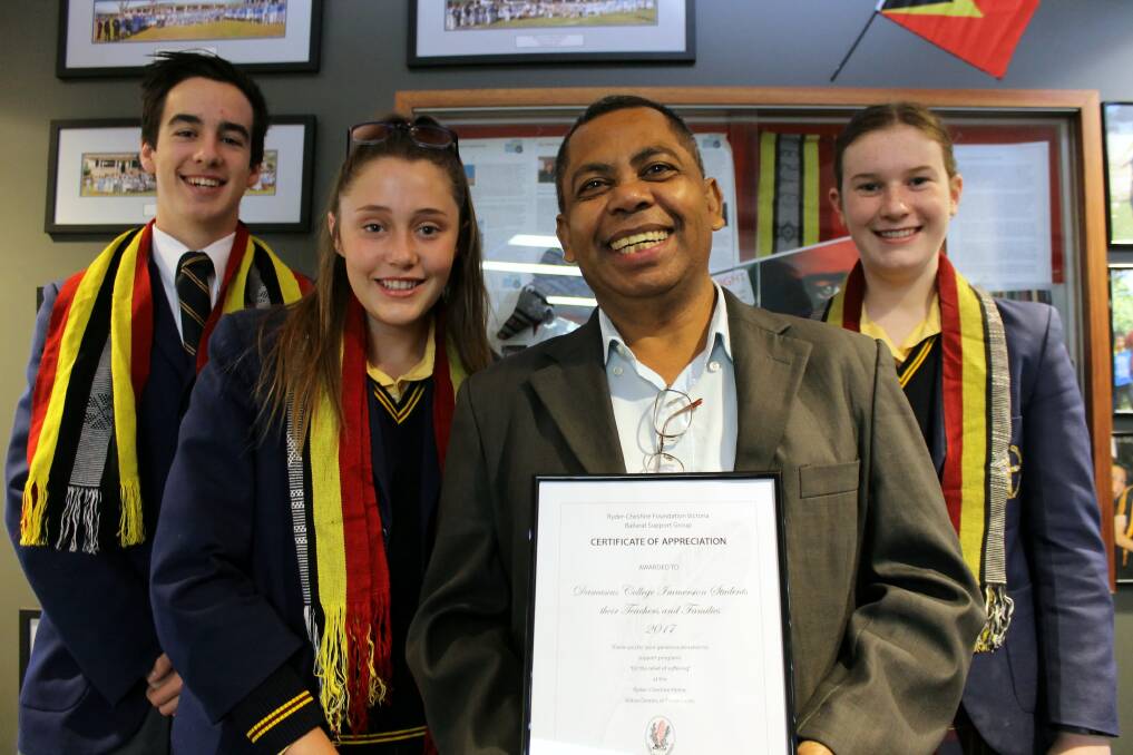 Year 11 Damascus College students Emma Webb, Spencer Bedggood, and Macy Ludeman with Kilbur Domin foundation CEO Joaquim Soares. Picture: Rochelle Kirkham 