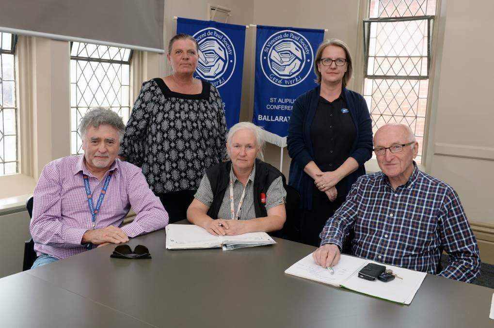  WORKING TOGETHER: Salvation Army's John Clonan, Uniting's Tania Jennings, Anglicare's Kim Boyd, Central Highlands Water's Rebecca Fletcher and St Vincent de Paul's Alan West. Picture: Kate Healy 