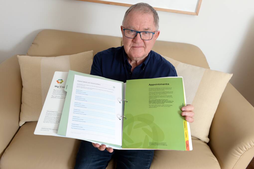 MY CANCER CARE RECORD: Grampians Integrated Cancer Service Consumer Advisory Group member Ian Kemp shows one section in the My Cancer Care Record to help manage appointments.